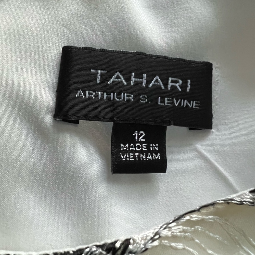 Sz12 Tahari Midi cream black sleeveless w/satin sash. Summer wedding hit!